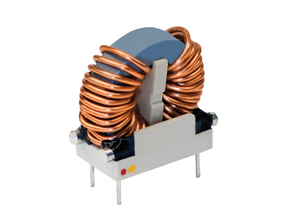 A toroidal power inductor with copper wire coils is mounted on a white rectangular base with four metal pins for electronic circuit connections. by Standex Edge