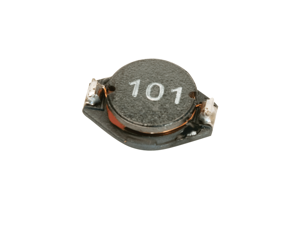 A close-up of a surface-mount electronic component, specifically an inductor labeled 101, commonly used in power magnetics, showing metal contacts on each side for mounting to a circuit board. by Standex Edge