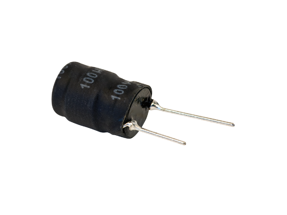 A black cylindrical electronic capacitor with two metal leads extending outward, placed beside a power inductor on a white background. by Standex Edge