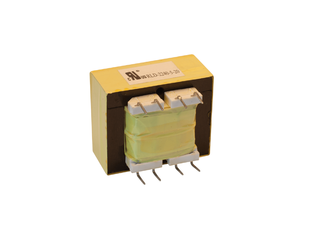 A yellow and black planar transformer component with metal pins and a white label on top, isolated on a white background. by Standex Edge