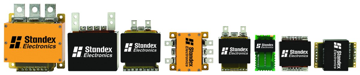 A row of eight Standex Electronics branded electronic components of various sizes and shapes, arranged from largest to smallest, highlights their optimized clearance and creepage distances against a white background. by Standex Edge